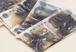  Женщина в Китае пыталась продезинфицировать банкноты в микроволновке