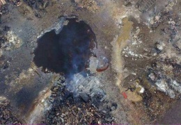На месте взрыва в Тяньцзине осталась гигантская воронка